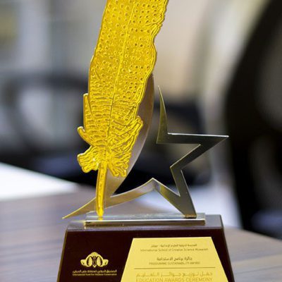 Gold-Metal-feather-with-Star-Wood-Base.jpg